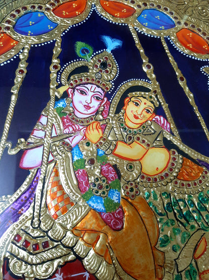 ORIGINAL HANDMADE TANJORE PAINTING OF RADHA KRISHNA ON SWING